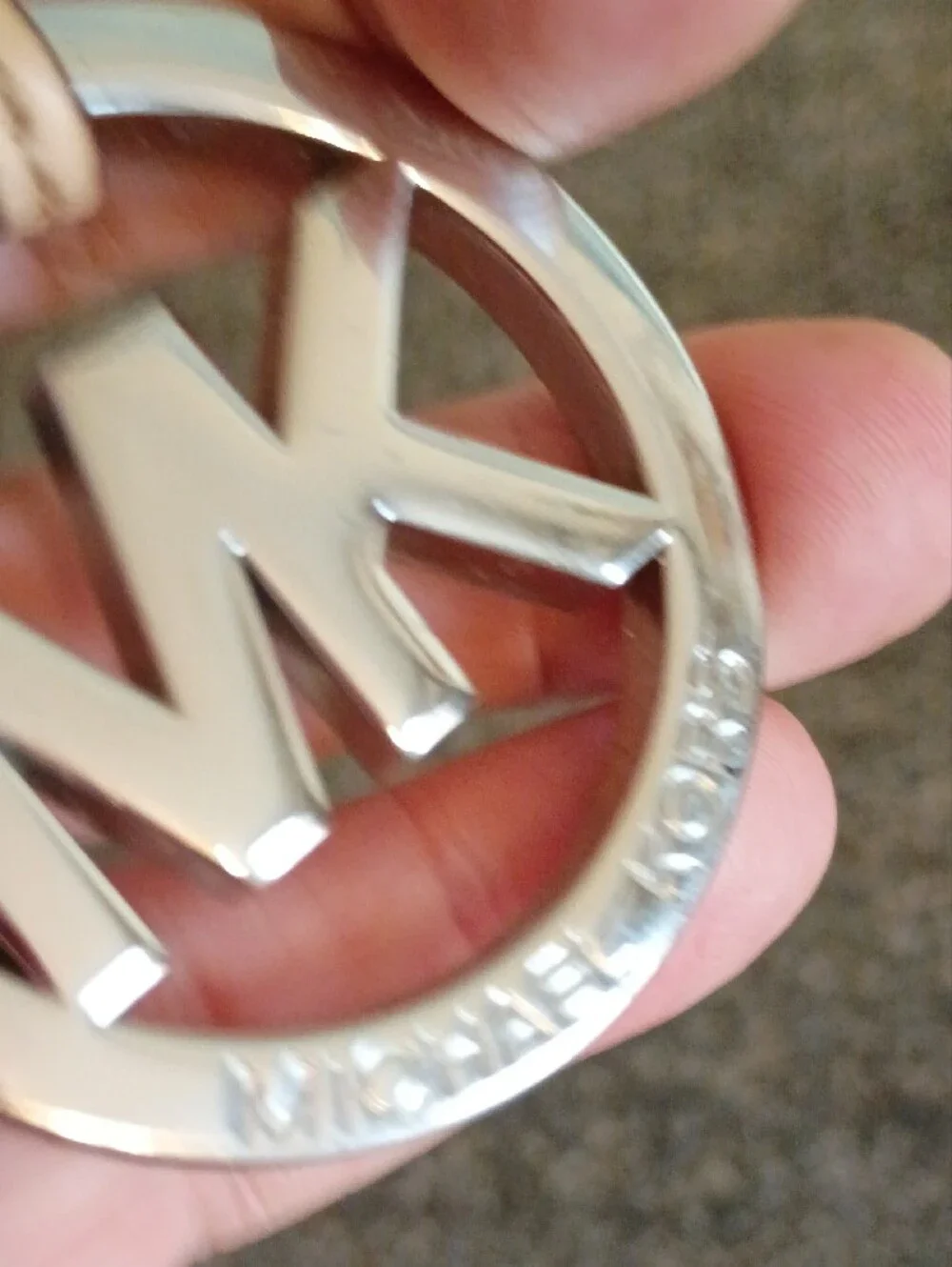 Michael Kors Silver MK Logo Charm with Tan Leather Loop